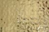Immagine di PANNELLO IN ACCIAIO EFFETTO BATTUTO GRANA GROSSA ORO LUCIDO 
